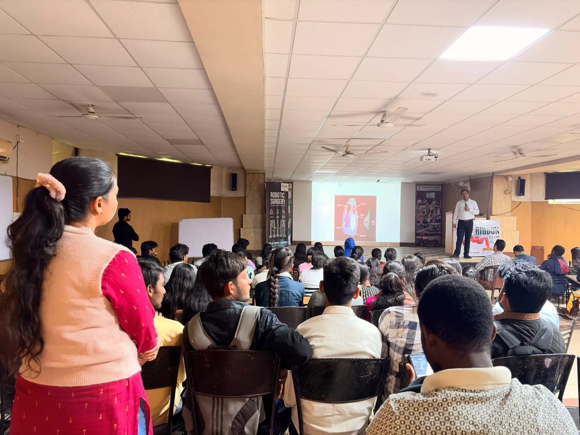 Dr. Anmol Rattan speaking to SBS students — lecture hall or seminar setting